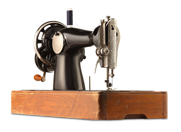 One vintage sewing machine isolated on white