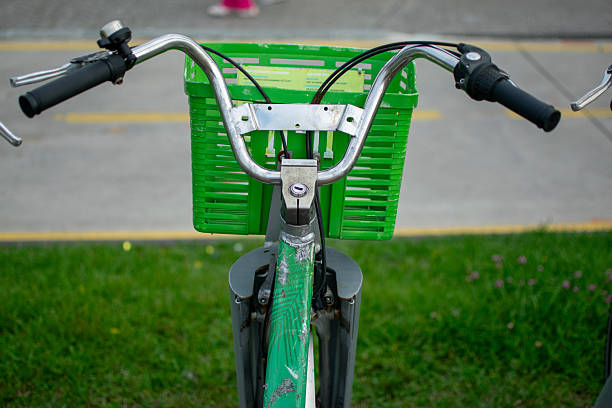Vintage Green Bicycle Parked on Grassy Pathside. High quality photo