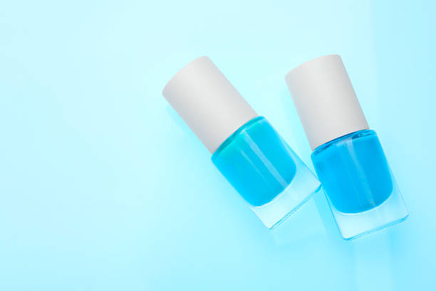 Spilled nail polish on white background.