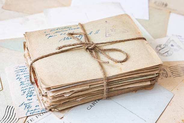 istock Stack of postal letters, old manuscripts and envelopes. Retro vintage background. 2222762780