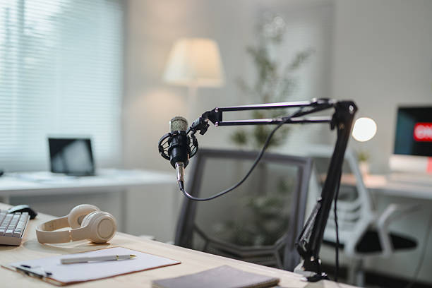 istock Modern home studio setup featuring a professional microphone, headphones, and other equipment, ready for podcasting or streaming 2222763972