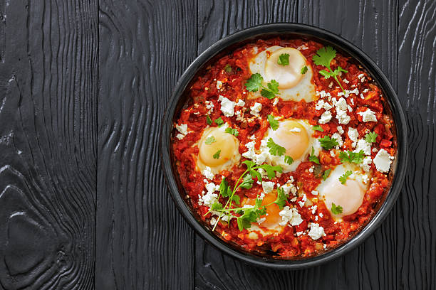 istock shakshuka, eggs poached in tomato vegetable sauce 2222766609