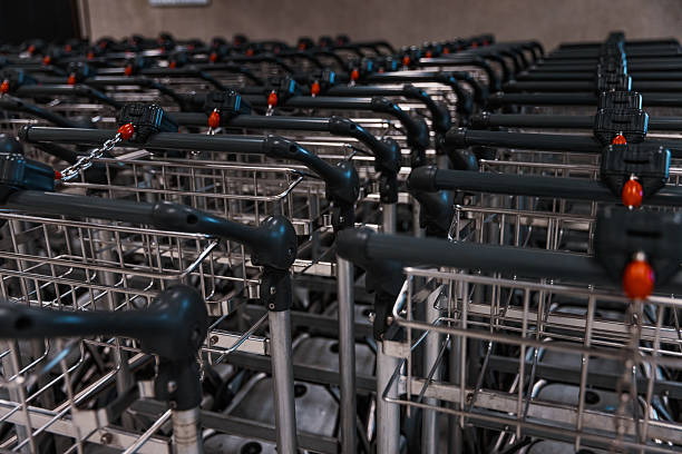 istock Organized Travel Trolleys in a Line 2222781488