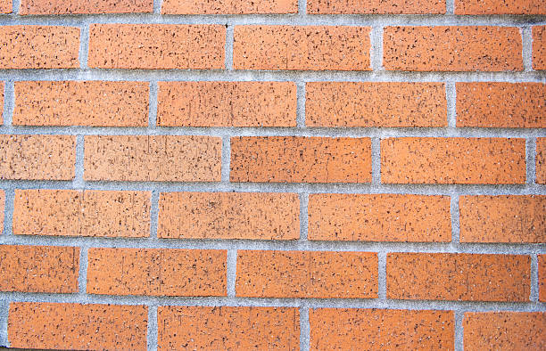 istock Brick masonry background. Building material concept. Surface of brickwall. Textured brown backdrop. Wall texture background. Brick wall structure 2222782069