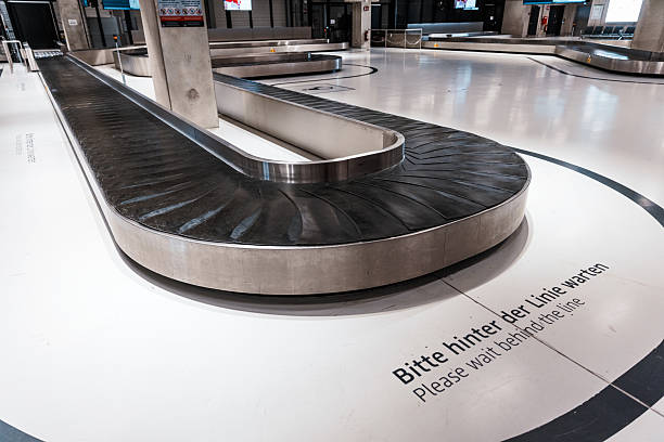 istock Luggage Belt with Waiting Line Marking 2222782176
