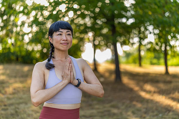 istock Beautiful Japanese woman practicing yoga concept, standing in Tree pose. 2222787577