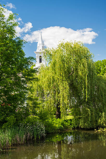 Scenic Raritan River with church in background, Clinton, New Jersey, USA