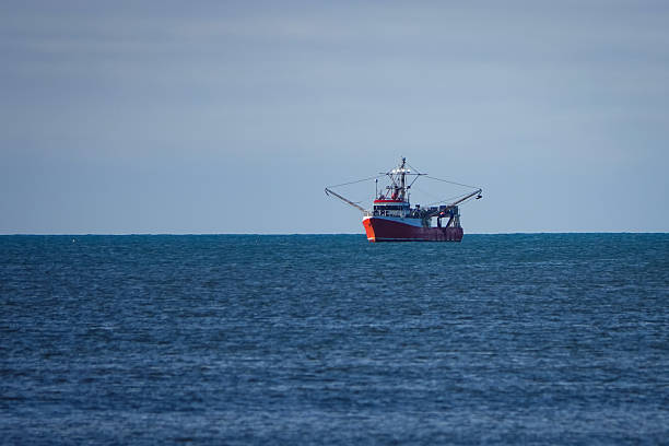 istock Red Fishing Trawler 2222798684