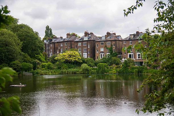 istock Hampstead Heath No 1 Pond with Houses in background 2222802201