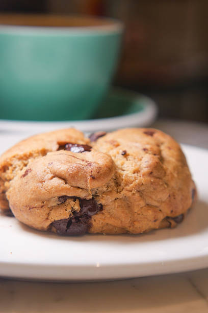 istock Freshly baked cookie served with a cup of coffee in cozy setting 2222802557