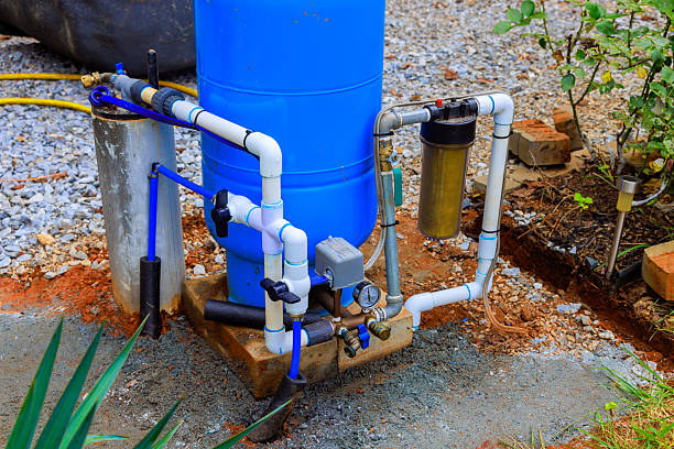 istock Water artesian well system setup in residential outdoor setting for efficient water use management 2222806561