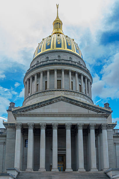 istock West Virginia State Capitol Building with Iconic Gold Dome Under Blue Sky 2222809689