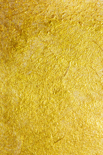 istock Gold acrylic paint texture on white paper background 2222814990