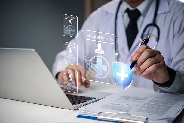 istock Doctor hand using digital medical record system on virtual screen, health data management, patient information, healthcare technology, telemedicine, hospital administration. 2222815992