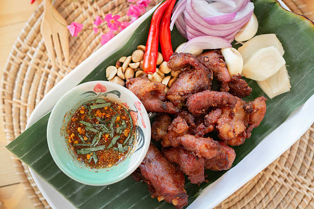 istock Fried Pork with Thai Spicy Dipping Sauce 2222817460