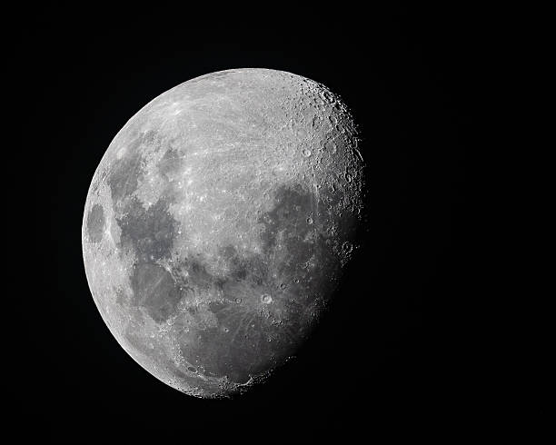 istock Half Moon Background. The Moon is an astronomical body that orbits planet Earth, being Earth's only permanent natural satellite 2222820276