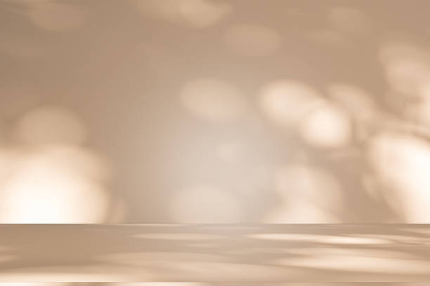 istock Studio style background wall decoration presentation uses white and beige tones. with shadows cast from a nearby window, concept creating a decorative 2222820430