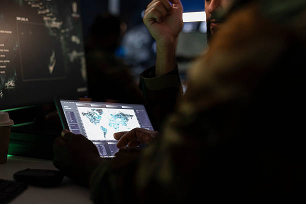 istock Army officers managing air traffic control using surveillance software on tablet 2222838846