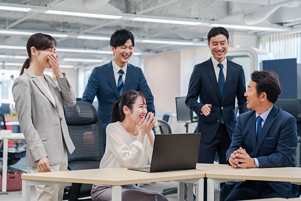 Team member and very smiling office worker