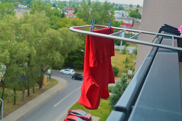 istock Balcony Laundry: Air-Drying Clothes in Urban Setting 2222848553