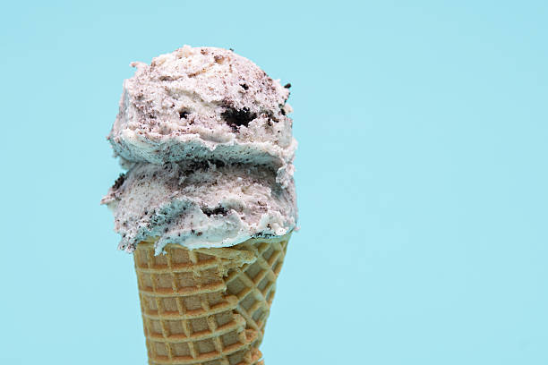 istock Double Scoop Cookies and Cream Ice Cream Cone 2222849564