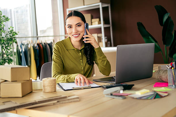 istock Busy businesswoman working on a startup in an organized modern workspace with a creative edge. 2222851221