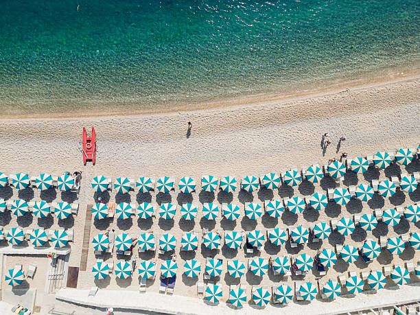 istock Italian coastline with beach umbrella rows 2222851890