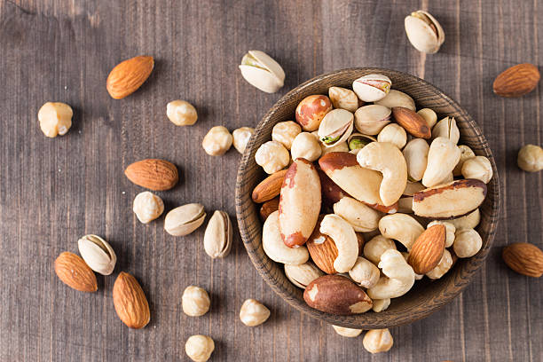 istock Healthy mix nuts. Almonds, hazelnuts, cashews, peanuts, pistachios, Brazil nuts 2222852386