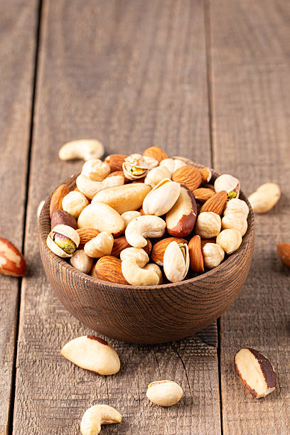 istock Healthy mix nuts. Almonds, hazelnuts, cashews, peanuts, pistachios, Brazil nutsv 2222852387