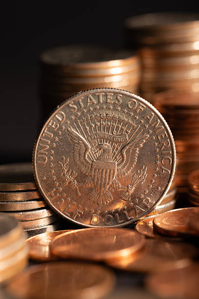 istock A stack of dollar coins stacked on each other in different positions. Money 2222852918