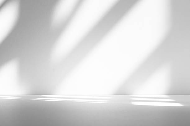 istock Wall interior background, studio and backdrops show products.with shadow from window color white . background for text insertion and presentation product 2222854418