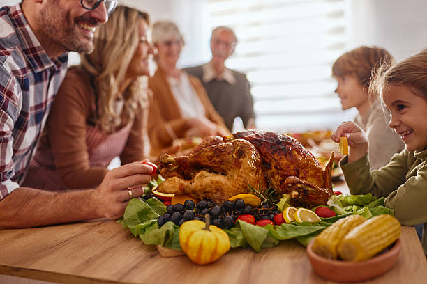 istock Decorating Thanksgiving turkey before family's lunch! 2222855399