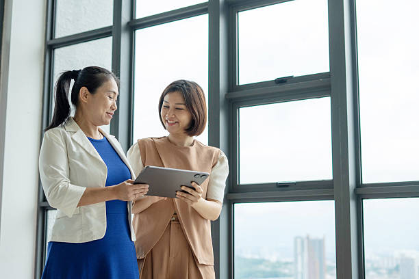 istock Confident business people working together in the office. 2222856633