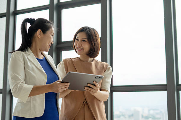 istock Corporate business persons discussing new project and sharing ideas in the workplace 2222856649