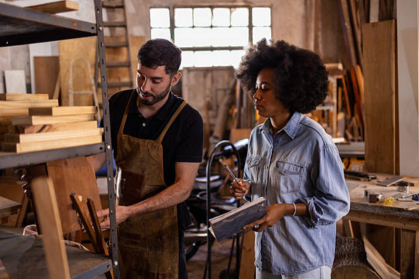 istock Team collaboration in a sustainable wood workshop workspace 2222864366