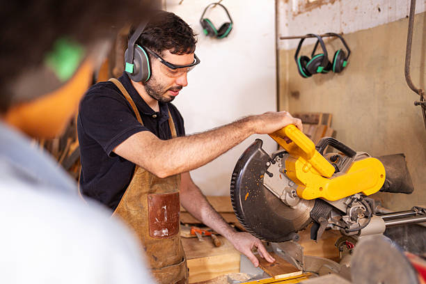 istock Artisan working with a power saw in a woodworking workshop 2222864397