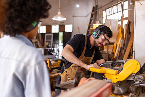 istock Woodworkers Crafting in a Busy Sustainable Workshop Environment 2222864403