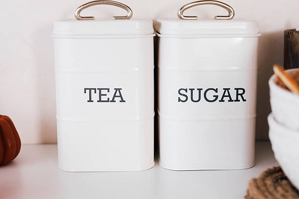 istock Containers for tea and sugar displayed in a cozy kitchen setting with minimalistic design 2222867429