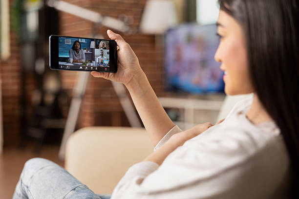 istock Professional woman on video conference with shareholders 2222868732