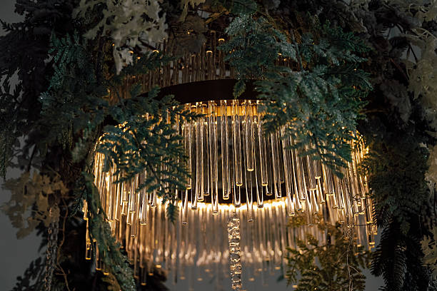 istock Elegant chandelier adorned with greenery creates an enchanting atmosphere in a modern space 2222869018