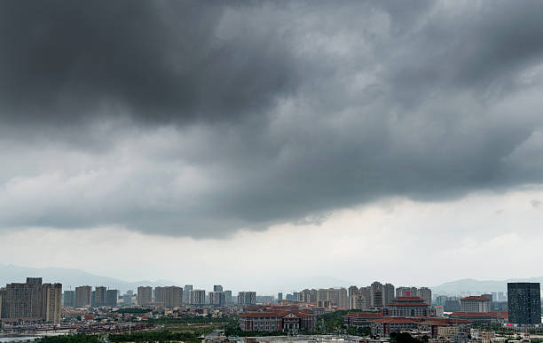 istock Dark stormy clouds over Chinese city 2222869682