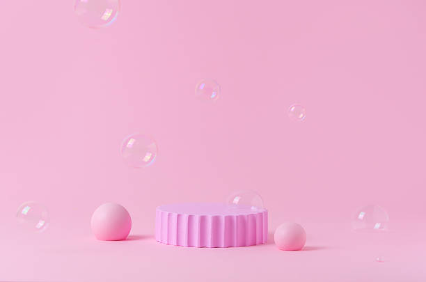 istock Pink Geometric Podium with Soap Bubbles on Pastel Background for Product Presentation Display 2222871431