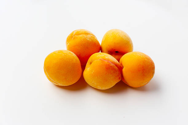 istock Fresh ripe apricots on a white background. 2222873440