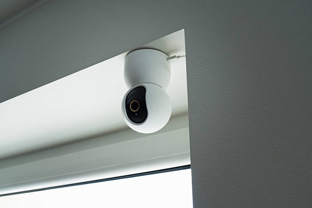 istock A modern PTZ IP camera of a smart home system. A white rotating surveillance camera installed on the ceiling for 24/7 monitoring. 2222877650