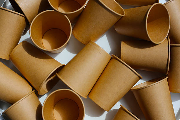 istock Brown paper cups on white background. 2222878871