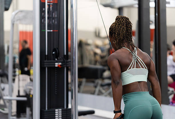 istock Determined sportswoman lifting weights at the gym 2222885757