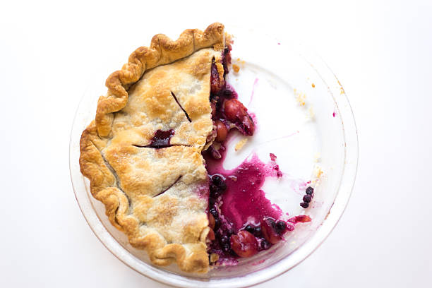 Fresh Homemade Cherry-Blueberry Pie Overhead Half-Eaten