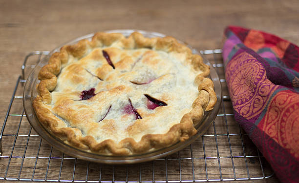 Fresh Homemade Cherry-Blueberry Pie on Cooling Rack