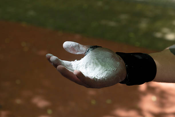 istock Athlete holding magnesium carbonate powder for calisthenics workout 2222887306
