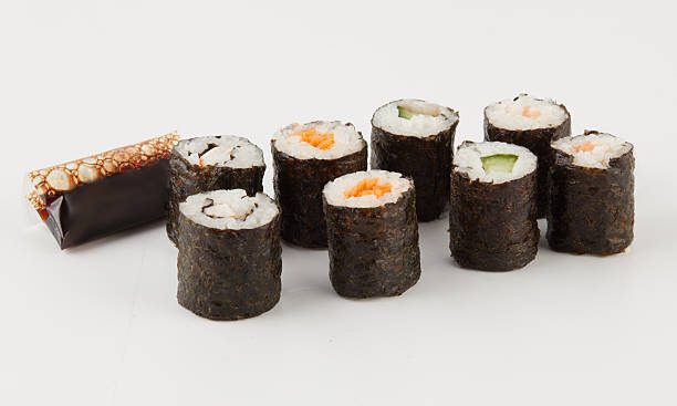 Sushi rice balls wrapped in seaweed isolated nature background with clipping path
